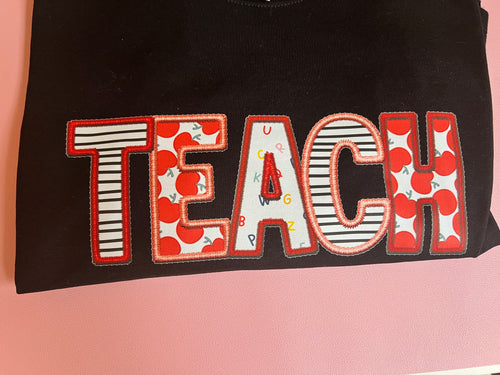 TEACH (black)